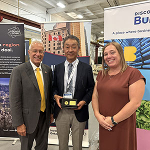 Ontario Minister of MEDJCT Vic Fedeli, SCMS CEO Masatoshi Kifuji, and IvO VP of BD Heather Potter
